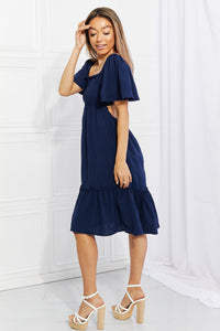 Davi & Dani Full Size Let's Laugh Smocked Bow-Look Back Dress